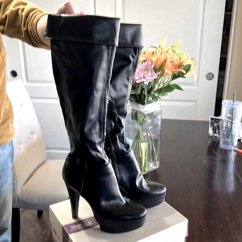 Used. Nine West black over the knee platform boots